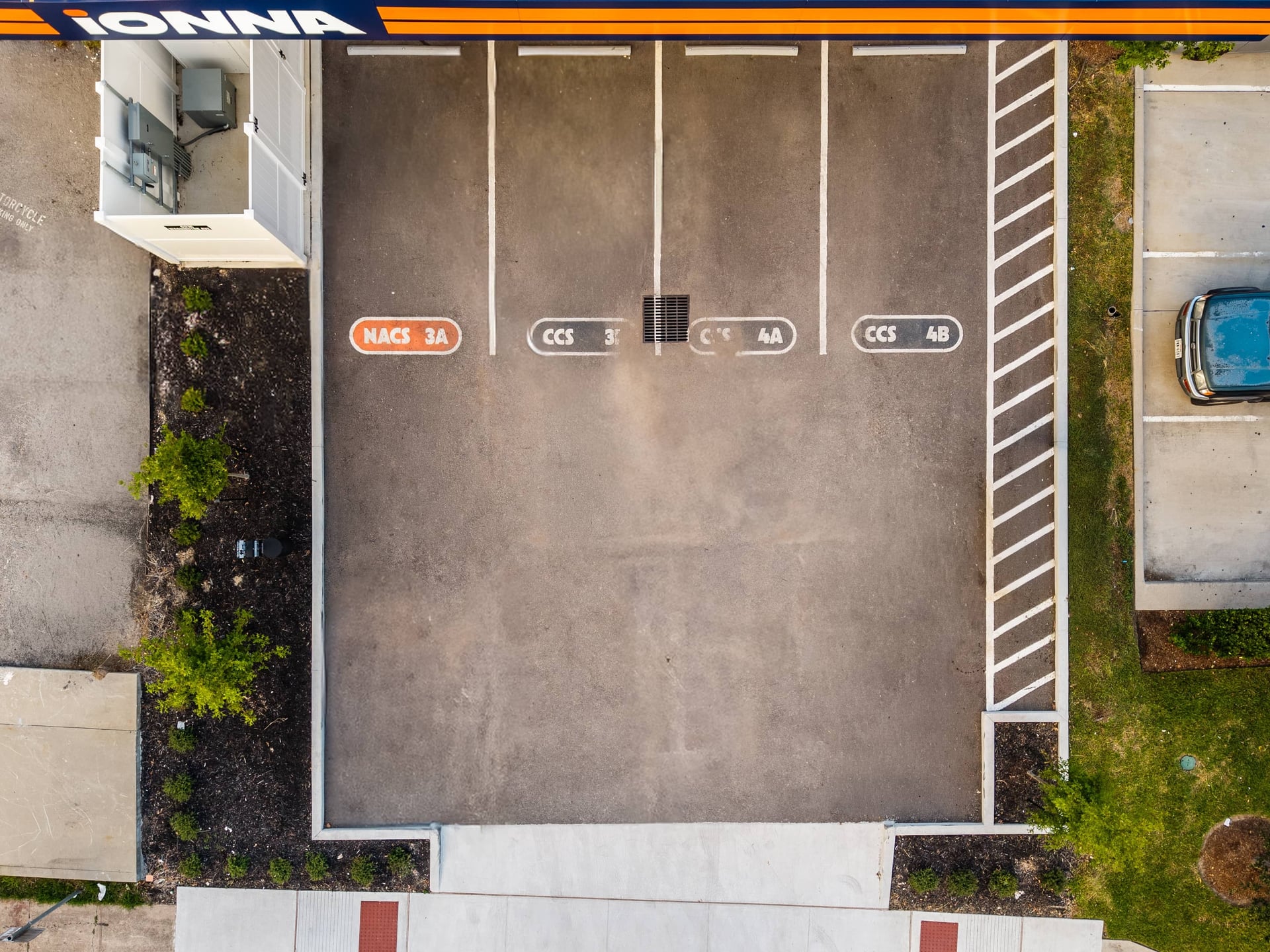 IONNA EV charging station site completion photography by IRL Marketing, daylight drone and ground coverage