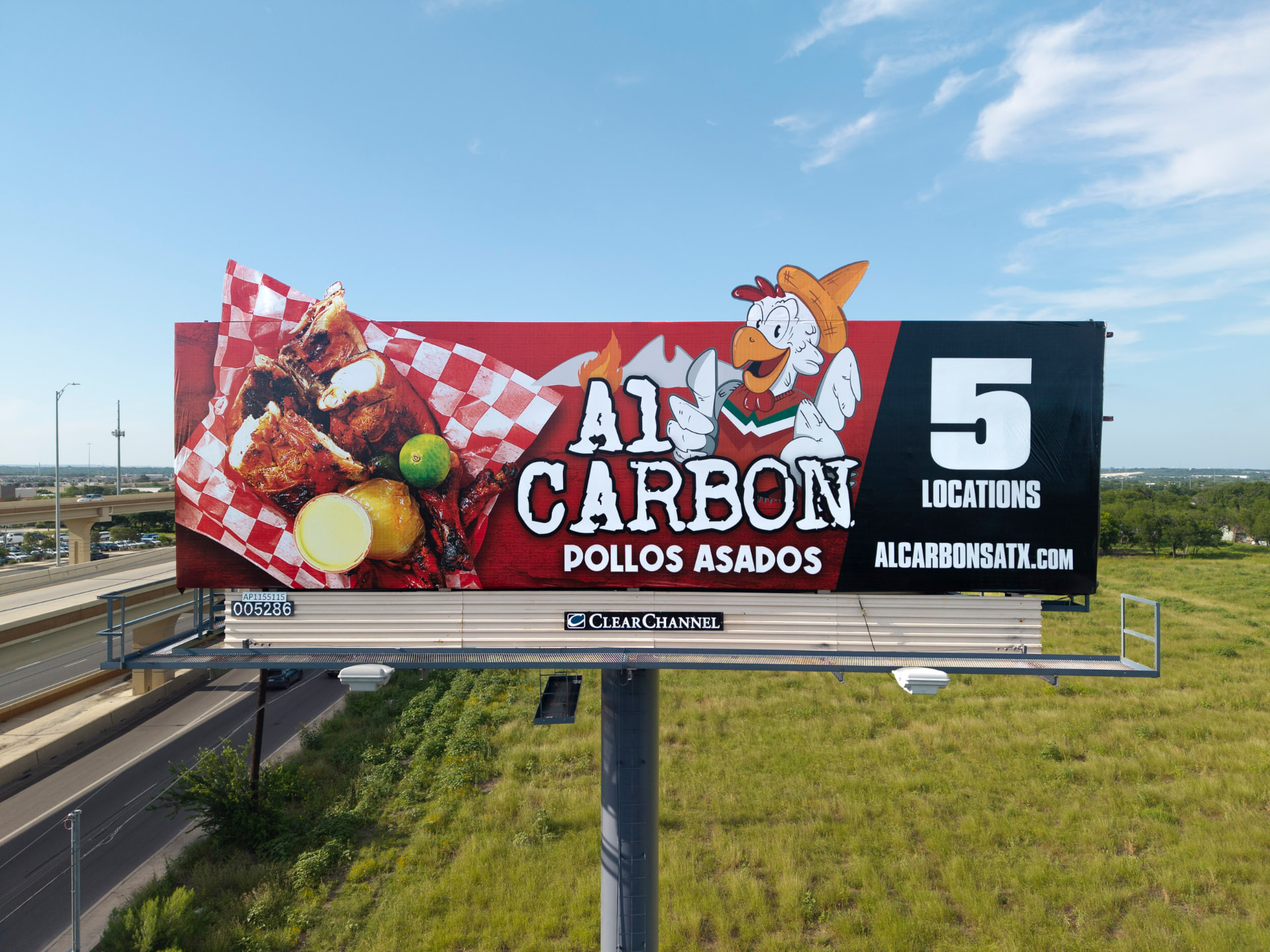 Completed highway billboard campaign photographed by drone for proof of posting
